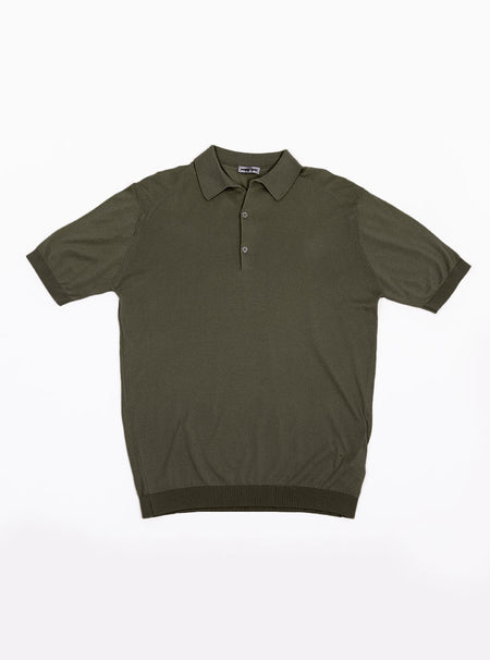 Flat lay of men's palm green short sleeved polo neck knit in a luxury and premium 100% merino wool.